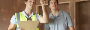 home inspector doing inspection on new home