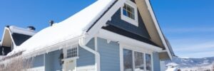 snow capped craftsman home eaves, sunny day, created with generative ai
